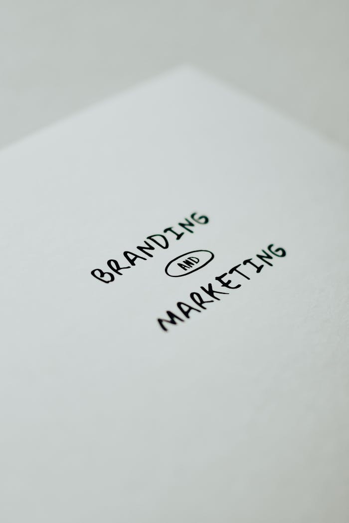 about-04 Minimalistic design showcasing 'branding and marketing' text for business strategy visuals.